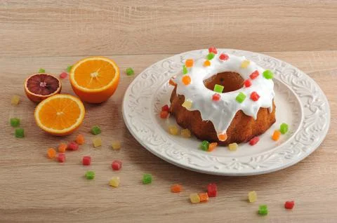 Easter cake at Easter with frosting and candied and oranges Stock Photos