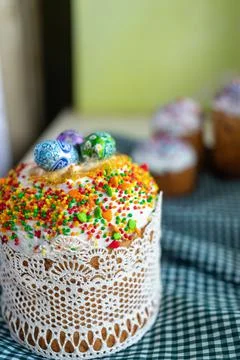 Easter cake with glace icing and decoration. Postcard with Easter bread. Chri Stock Photos