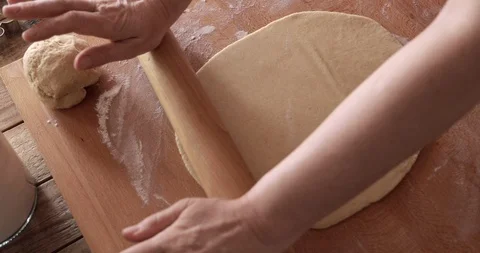 Easter cake making, dough stretching, steadicam close-up Stock Footage 104951401
