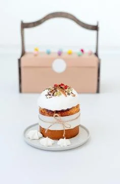 Easter cake. Orthodox sweet bread, kulich, traditional food on light backgrou Stock Photos