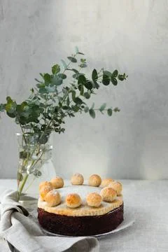 Easter cake simnel for breakfast on a grey background. Stock Photos