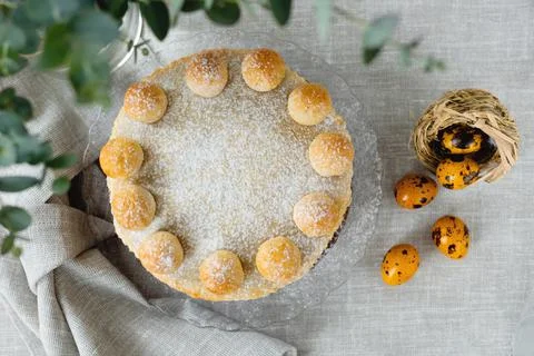 Easter cake simnel for breakfast on a grey background. Stock Photos