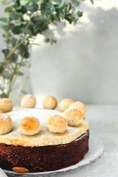 Easter cake simnel for breakfast on a grey background. Stock Photos