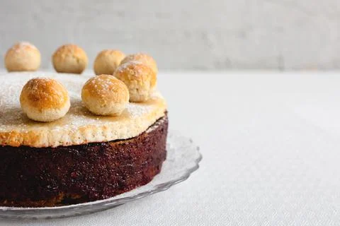Easter cake simnel for breakfast on a grey background. Stock Photos
