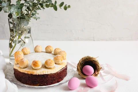 Easter cake simnel for breakfast on a grey background. Stock Photos