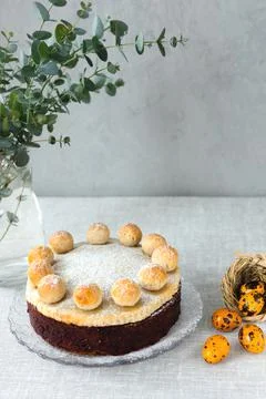 Easter cake simnel for breakfast on a grey background. Stock Photos