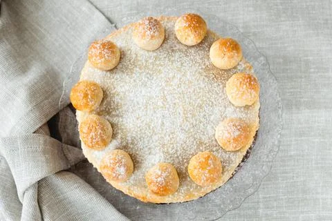 Easter cake simnel for breakfast on a grey background. Stock Photos