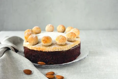 Easter cake simnel for breakfast on a grey background. Stock Photos