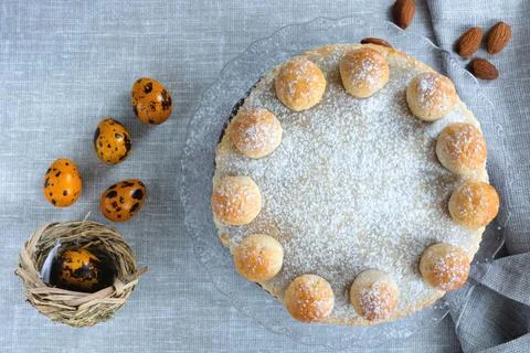 Easter cake simnel for breakfast on a grey background. Stock Photos