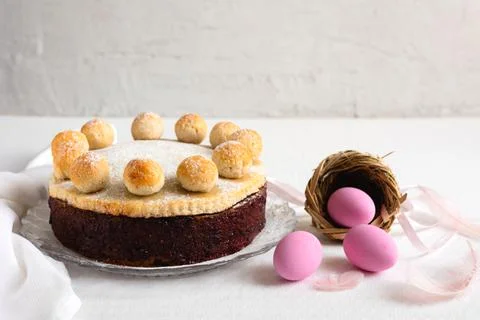 Easter cake simnel for breakfast on a grey background. Stock Photos