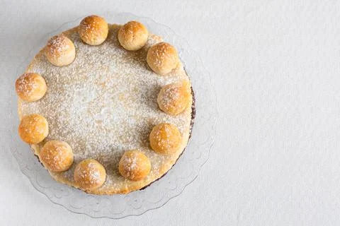 Easter cake simnel for breakfast on a grey background. Stock Photos