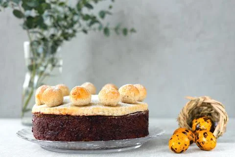 Easter cake simnel for breakfast on a grey background. Stock Photos