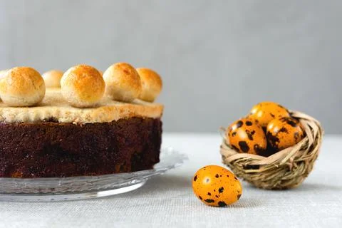 Easter cake simnel for breakfast on a grey background. Stock Photos