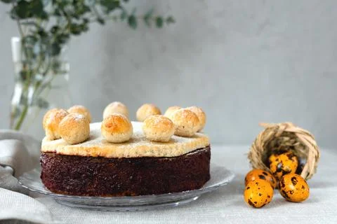 Easter cake simnel for breakfast on a grey background. Stock Photos
