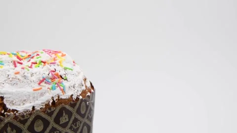 Easter cake turning against gray background Stock Footage 275278240