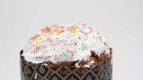 Easter cake turning against gray background Stock Footage 275278520