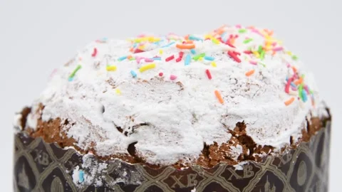 Easter cake turning against gray background Stock Footage 276704313