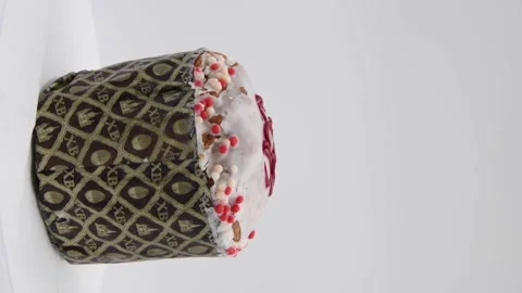Easter cake turning against gray background Stock Footage 276705032