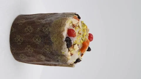 Easter cake turning against gray background Stock Footage 277150653