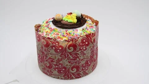 Easter cake turning against gray background Video stock 277151075