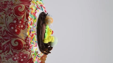 Easter cake turning against gray background Stock Footage 277151256