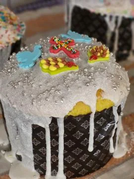 Easter cake with white icing close-up festive composition Stock Photos