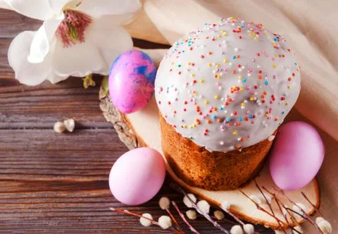 Easter cake with willow twigs and pink eggs, magnolia flower,  top view, Stock Photos