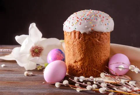 Easter cake with willow twigs and pink eggs, magnolia flower, Stock Photos