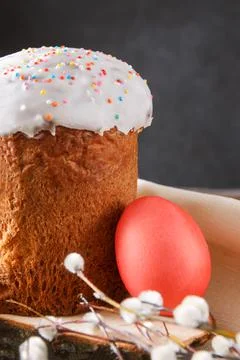 Easter cake with willow twigs and 1 red egg Stock Photos
