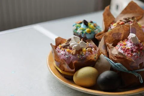 Easter cakes with colorful eggs on the table.  Happy Easter. Homemade cakes f Stock Photos