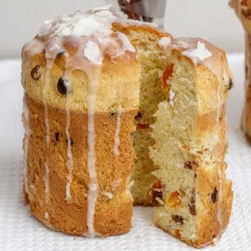 Easter cakes with icing. Sweet bread with raisins and apricots Stock Photos