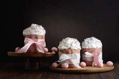 Easter Cakes with Sprinkles and Easter eggs. Festive Spring Arrangement Stock Photos