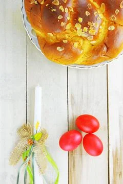 Easter candle,eggs and bread Stock Photos