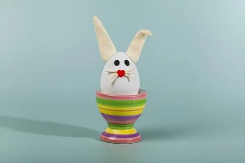 Easter card design. Easter hare egg  on a stand Stock Photos