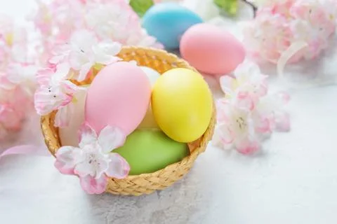 Easter card with easter eggs and pink flowers Stock Photos