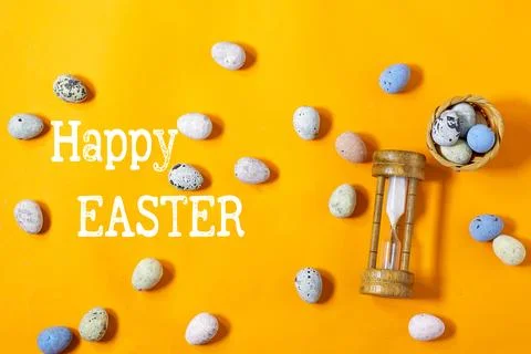 Easter celebration concept featuring painted decorative eggs, themed letters spe Stock Photos