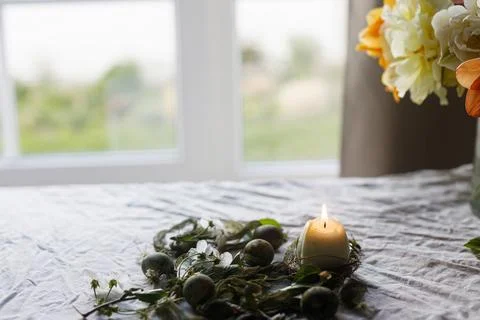 Easter celebration. Stylish green easter eggs, flowers, cherry blossoms and.. 库存照片