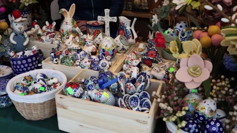 Easter ceramics and painted eggs market stall display Stock Footage 331812137