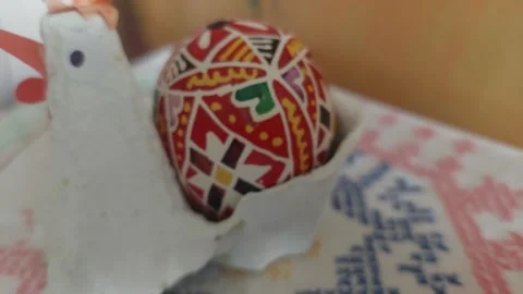 Easter Chicken Decoration Made of Paper Carton with a Painted Egg Stock Footage 333642277