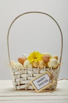 Easter chicken quail eggs straw Stock Photos