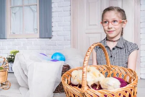 Easter chickens in the hands of child Stock Photos
