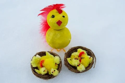 Easter chickens on snow Stock Photos