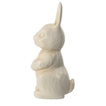 Easter chocolate bunny, side view on white background Illustrazione stock