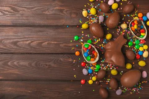 Easter chocolate egg on textured background. Stock Photos