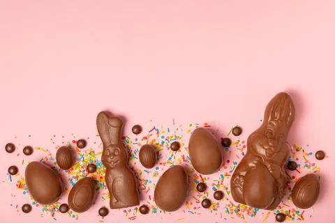 Easter chocolate egg on textured background. Stock Photos