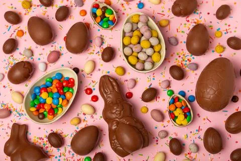 Easter chocolate egg on textured background. Stock Photos