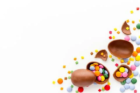 Easter chocolate eggs and sweets, top view Stock Photos