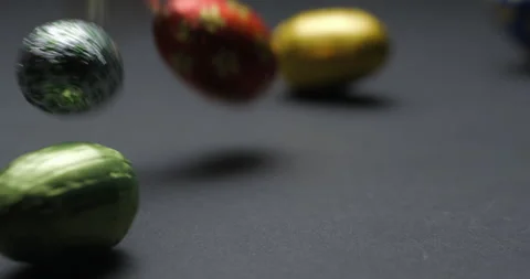 Easter chocolate eggs studio slowmotion 4K Stock Footage 150069806