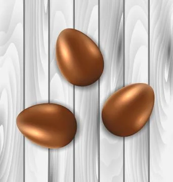 Easter chocolate three eggs on grey wooden background Stock Illustration