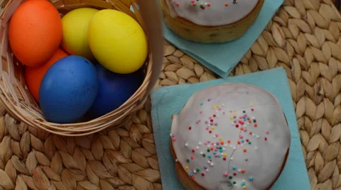 Easter Colored Eggs in a Basket and Rotate Cakes Stock Footage 62707430